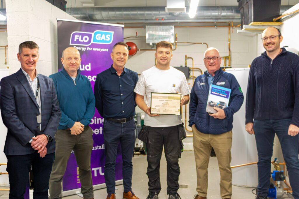 Daniel Herlihy, centre, holds his certificate alongside Alan Duffy, TUS; Frank Rushe, TUS; Mike Murphy, Flogas; Donal Moran, Flogas; and John Flannery, TUS, in the plumbing workshop at the Athlone campus.
