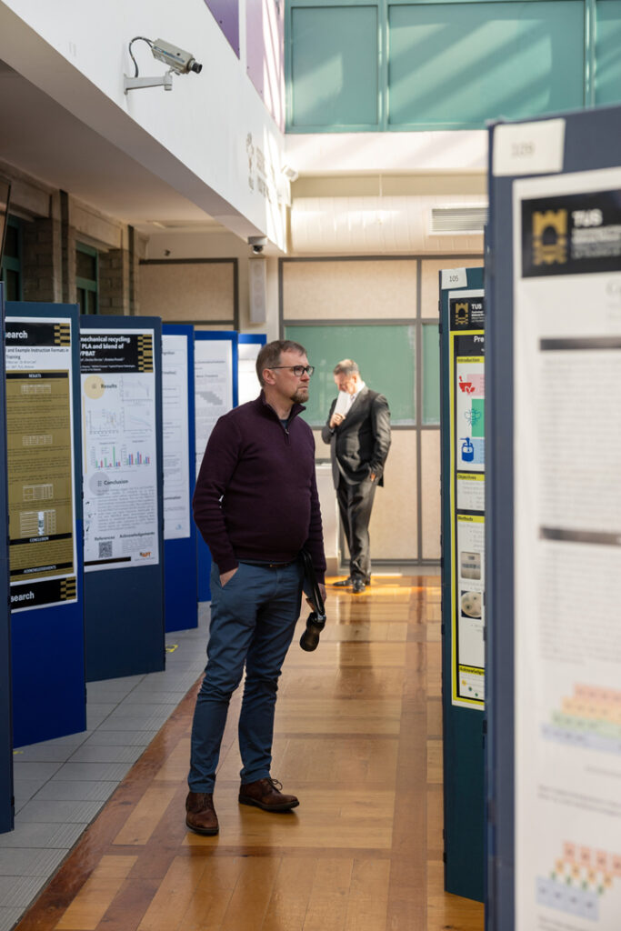 Pictured: Dr Paul Liston, Lecturer in Business engrossed in the Postgraduate Research Impact display, hosted on the TUS Athlone Campus, Main Building. Photo: Nathan Cafolla