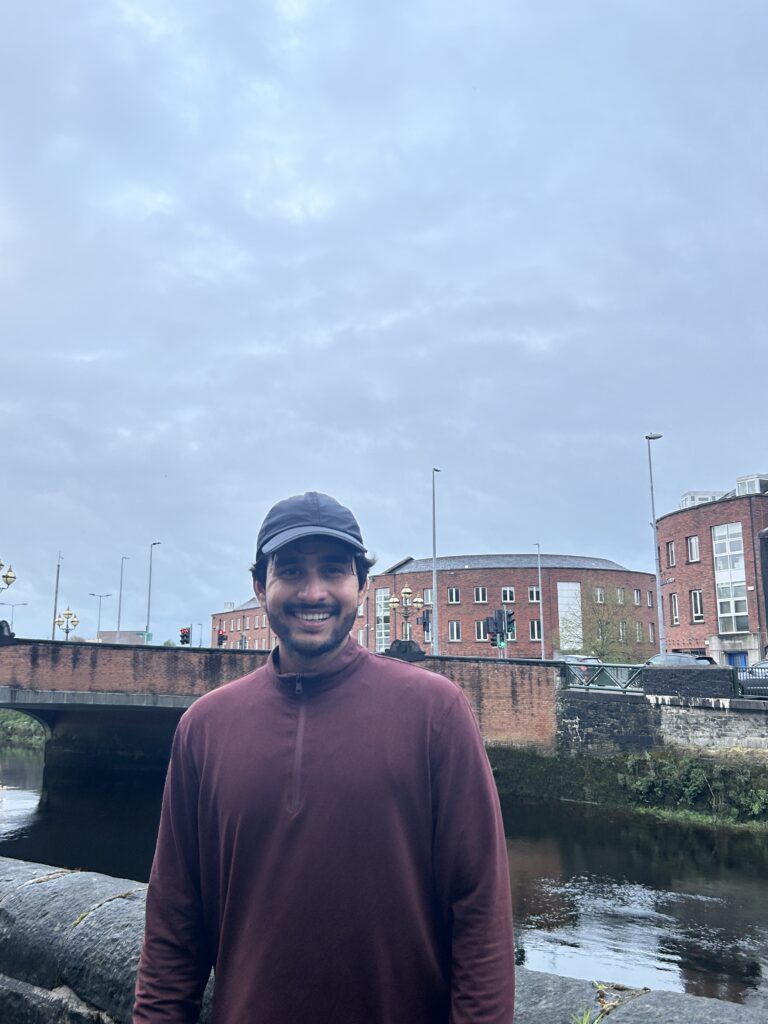Siddharth  Sinha behind the River Shannon in Limerick, Ireland