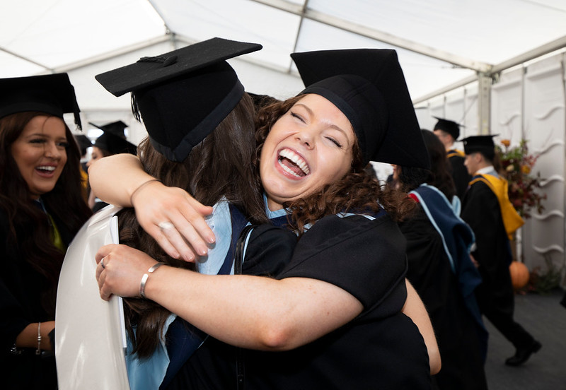 Two graduates hugging at the TUS 2022 Conferring Ceremony on the Moylish Campus.