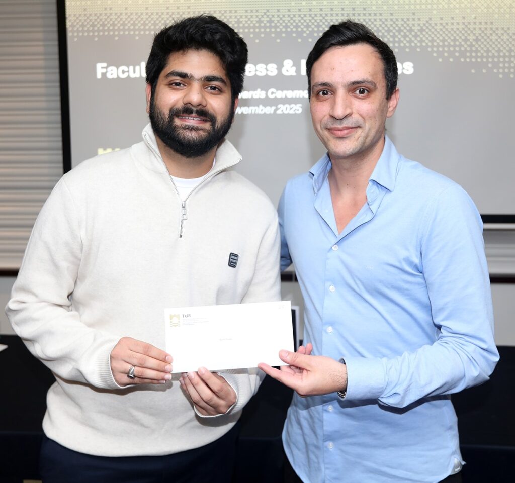 Byron Belstead, Rugby Operations Manager at Stats Perform, presents Sumit Trivedi with the Award for Excellence on the MSc. in Data Analytics.